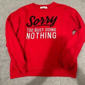 Red Sweater with Printed Words